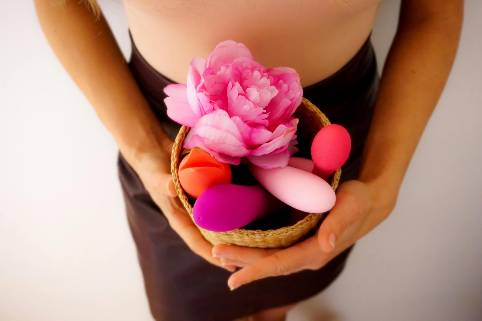 Collection of colorful lemon vibrators and adult toys displayed together